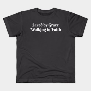 Saved by Grace Walking in Faith (White Lettering) Kids T-Shirt